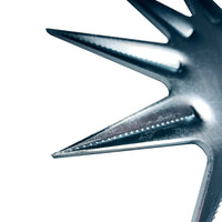 Close-up of a metallic starburst sculpture mimics the precision of Brinly Parts 40 Tow-Behind Spike Aerator (SAT2-40BH-P). Its shiny texture on a white background emphasizes its role in efficient soil penetration and lawn root system enhancement.