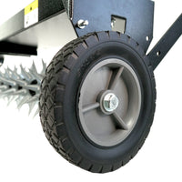 The Brinly Parts 40 Tow-Behind Spike Aerator (SAT2-40BH-P) features a spiked wheel with robust black rubber tread and a metal axle, designed for efficient soil penetration to enhance your lawns root system.