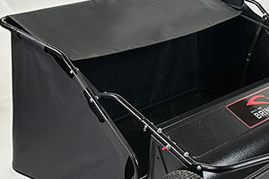 A close-up view of a black, fabric-covered garden cart. The cart has a metal frame, one visible wheel on the right, and a partially open top cover.