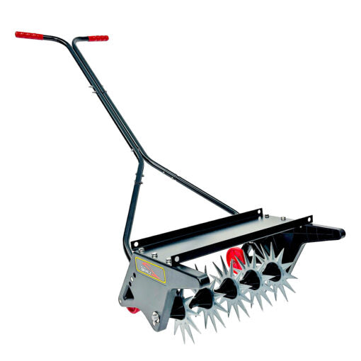 Manual lawn aerator with spiked wheels and a black handlebar featuring red grips. The metal frame supports rotating spiked discs for soil aeration.