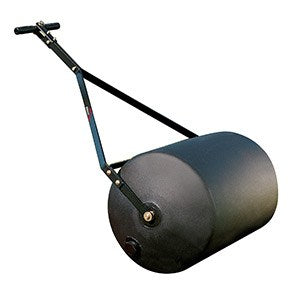 A black push lawn roller with a large cylindrical roller and an adjustable handlebar. The roller is designed for flattening uneven ground, typically used for lawn maintenance.