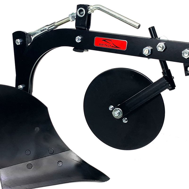 Close-up of the Sleeve Hitch Moldboard Plow | PP-510 by Brinly Parts, featuring a black curved moldboard on the left and a circular disc on the right, mounted on a sturdy frame with a red label. Includes bolts and handle design elements.