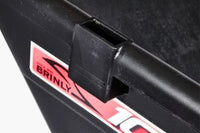 Close-up of a black 10 Cu. Ft. Poly Cart | PCT-101BH by Brinly Parts, featuring a rectangular bracket and a partial red and white Brinly label.