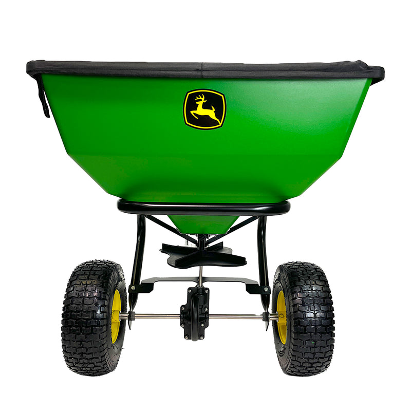 Front view of the John Deere 200 lb Tow-Behind Broadcast Spreader (LP79932) with ACCUWAY, featuring two large black wheels and the John Deere logo on its spacious container.