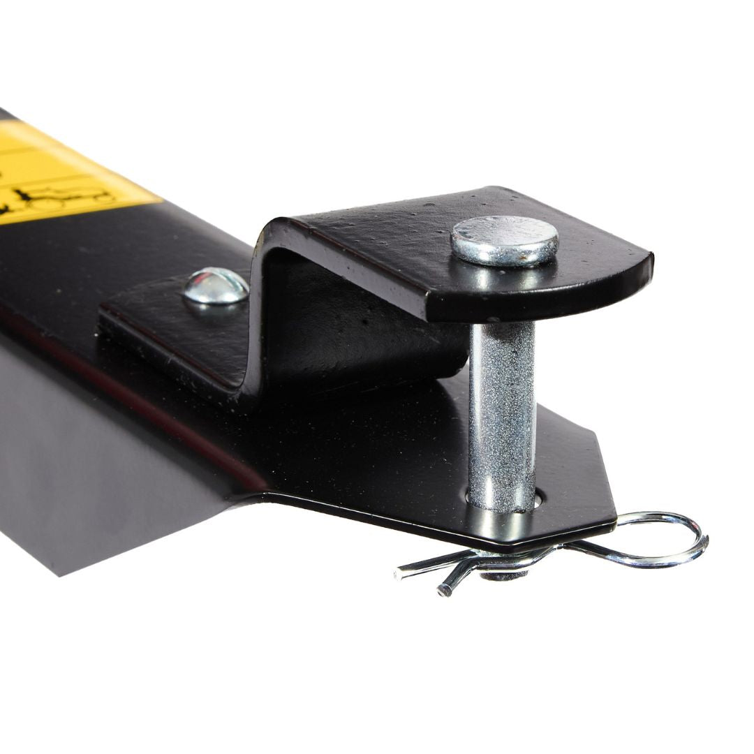 Close-up of a black metal bracket with a silver pin and clip, attached to a flat metal piece on the Brinly Parts 10 Cu. Ft. Poly Cart (PCT-101BH), ensuring secure and sturdy assembly for lawn or utility carts.
