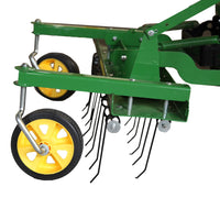 The John Deere 38" Front-Mount Dethatcher (LP48004) features a green metal frame with two yellow wheels and multiple black tines extending downward, making it an excellent choice for effective tilling or raking soil for lawn maintenance.