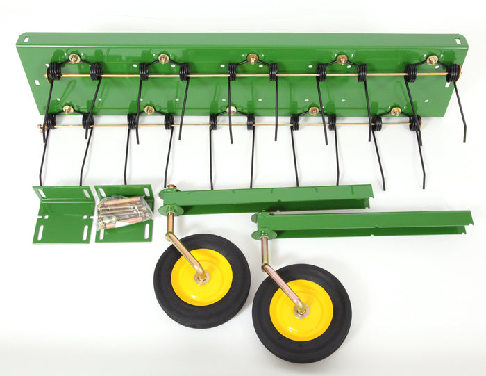 The John Deere 38 Front-Mount Dethatcher (LP48004) features metal tines and yellow wheels, brackets, and screws to enhance lawn health, all displayed on a white background.