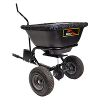 The Brinly Parts 125 LB. Tow-Behind Deluxe Spreader (BS261BH-A) features a rust-proof polyethylene hopper and cover. With a sturdy metal frame, large wheels, and an adjustable handle, its perfect for fertilizing lawns or evenly distributing seeds in gardens.