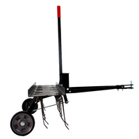 Side view of the Brinly Parts 40″ Tow-Behind Dethatcher (DT2-40BH-G) in black with wheels, a handle featuring a red grip, and multiple metal tines for effective thatch removal. Includes a tow bar for easy vehicle or lawnmower attachment. Background is plain white.