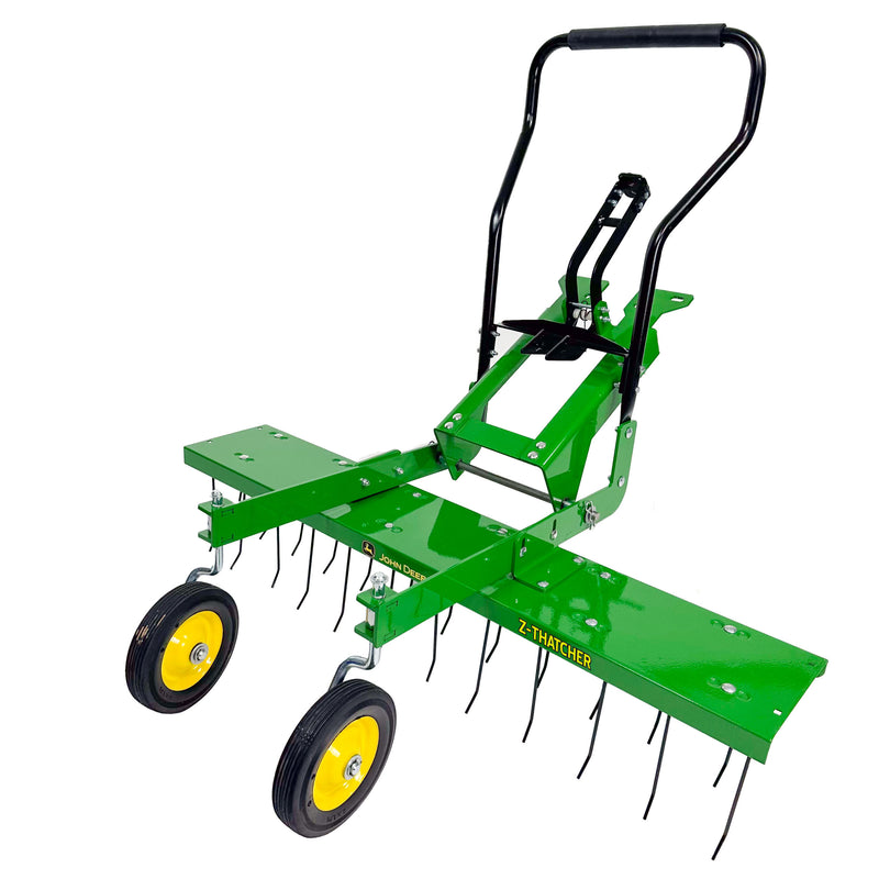 A green John Deere Front-Mount 48 ZTR Dethatcher (CPLP83252) with a black handle, two yellow wheels, and flexible spring steel tines for effective thatch removal is compatible with the John Deere Z-Trak Mower and labeled Z-Thatcher.