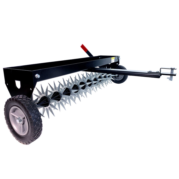 The Brinly Parts 40″ Tow-Behind Spike Aerator (SAT2-40BH-G) features spiked rollers on a cylindrical drum, a black frame, two large rubber transport wheels, and a wide channel tow bar with a handle for vehicle attachment, making it ideal for effective lawn aeration.