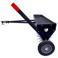 Side view of the Brinly Parts 40" Tow-Behind Spike Aerator (SAT2-40BH-P2) with extra-strength double tow bar, spiked wheels, metal hopper, transport wheels, and red-capped handle—designed for yard aeration behind your tractor.