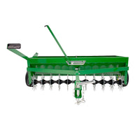 The John Deere 2-in-1 Aerator Spreader with Weight Tray (LPAS40JD/AS-400JD) features spiked wheels, a large hopper, and a tow bar for easy vehicle attachment; shown from the front against a white background.