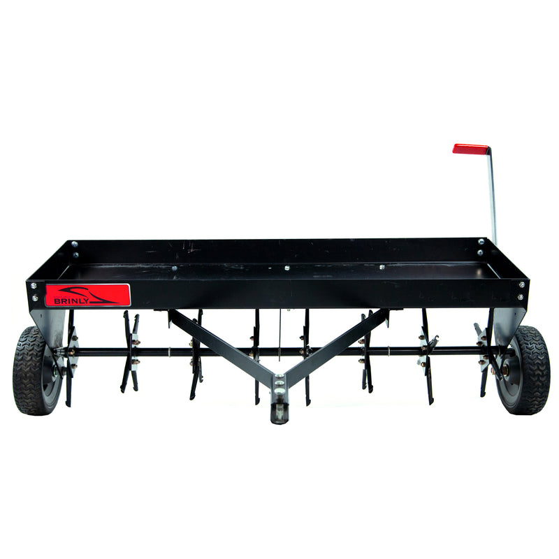 The Brinly Parts PA-482BH 48 Tow-Behind Plug Aerator features sturdy steel tines, a large tray on top with multiple metal spikes underneath, side wheels, and a front hitch attachment. Ideal for promoting healthy root zones against a crisp white background.