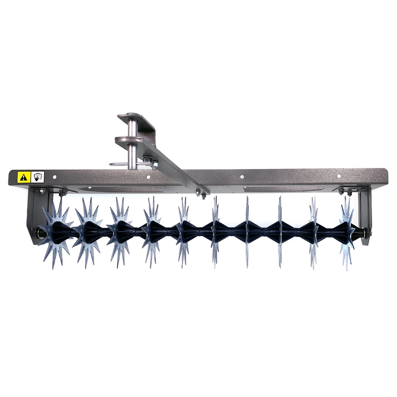 The Brinly Parts 40″ Tow-Behind Spike Aerator in Hammered Gunmetal (SA2-40BH-S) features multiple spiked wheels and a mounting bracket, easily attaching to garden equipment for improved soil aeration and efficient thatch removal.