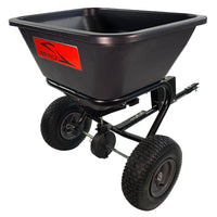 The 125 lb. Tow-Behind Broadcast Spreader (BS26BH) by Brinly Parts features a rust-proof polyethylene hopper and two large wheels. Its metallic frame supports a sleek black design with the BRINLY logo in red, making it ideal for efficient lawn fertilization.