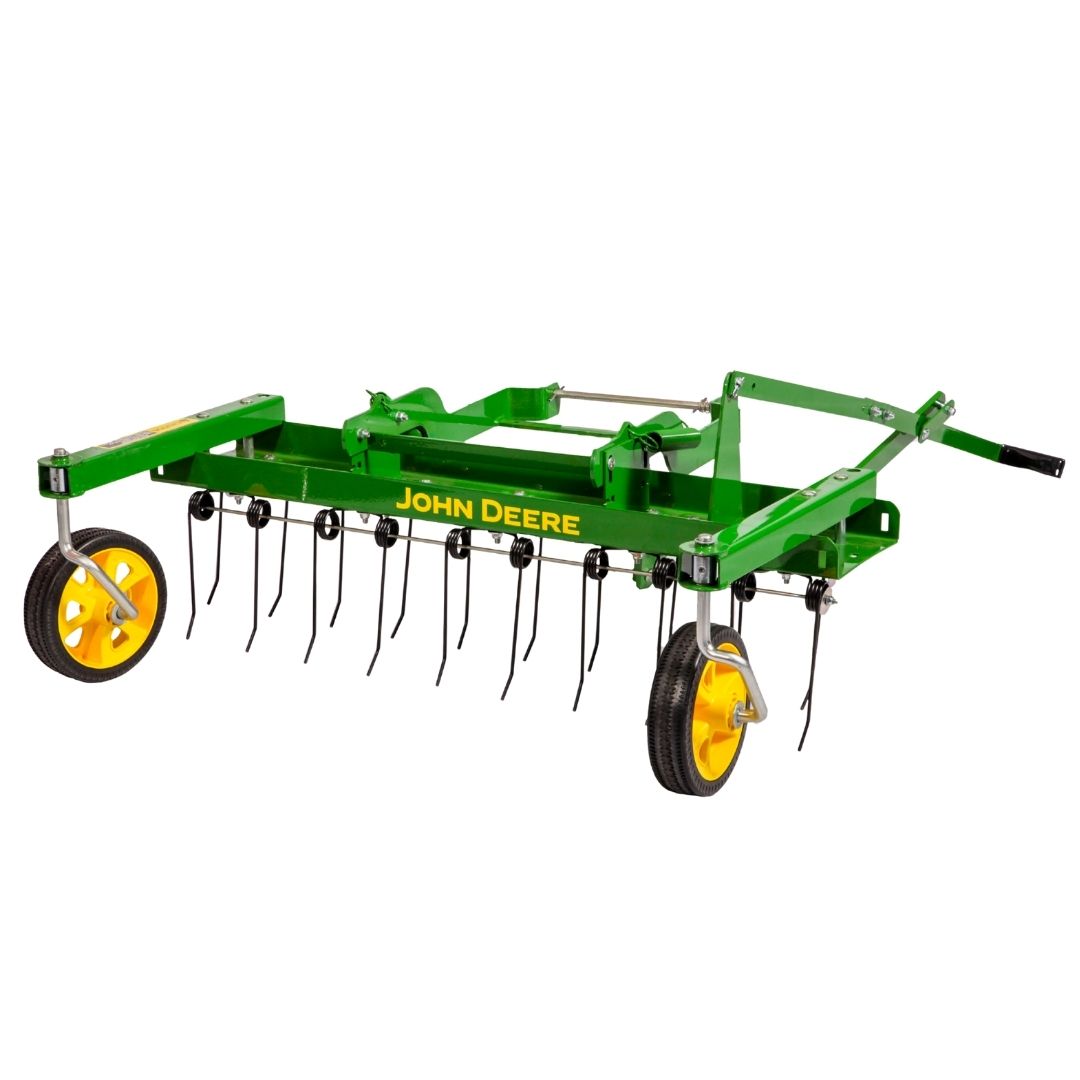 The John Deere 38" Front-Mount Dethatcher (LP48004) is a green agricultural implement from John Deere, featuring yellow wheels and multiple metal tines. Designed for lawn maintenance or soil cultivation, it is shown against a white background.