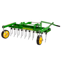 The John Deere 38" Front-Mount Dethatcher (LP48004) is a green agricultural implement from John Deere, featuring yellow wheels and multiple metal tines. Designed for lawn maintenance or soil cultivation, it is shown against a white background.