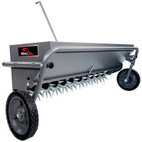 The Brinly Parts 40 Combination Aerator Spreader in Hammered Gunmetal (AS2-40BH-S) features a sturdy metal frame, two large wheels, and sharp spikes for efficient soil aeration. It has an ergonomic handle for easy maneuvering, with the manufacturers logo prominently displayed on the side.