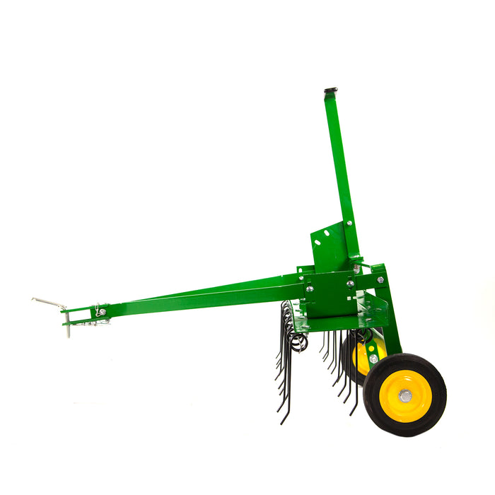 The John Deere 40 Tow-Behind Dethatcher (LPTA40JD/TA-400JD) features yellow wheels and metal tines designed for tilling and aerating, with a green body. It has an arm for tractor attachment and is displayed on a white background.