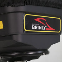 The Brinly Parts 70 lbs. Capacity Broadcast Ice Melt Spreader (PS10-70BH) features a black design with a yellow and black label, showcasing a red swoosh and Since 1839 BRINLY, and includes a calibration dial for precision.