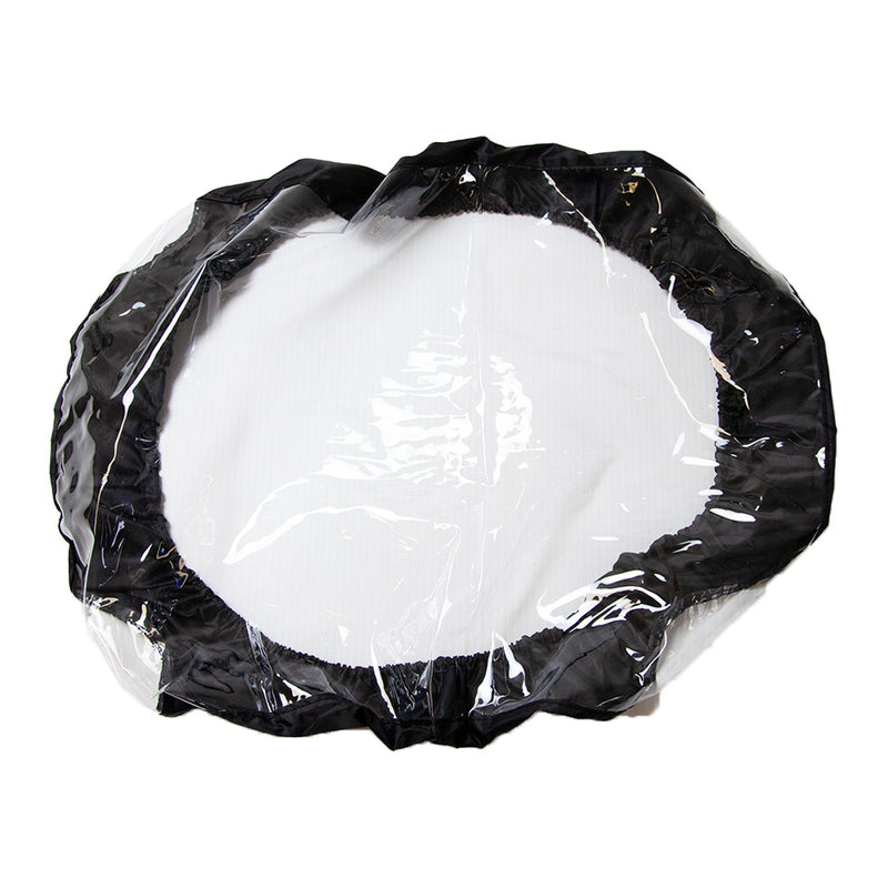 A see-through shower cap featuring a black elastic edge resembles an elegant hopper cover, product 1009191 from Brinly Parts, rests flat on a white surface.