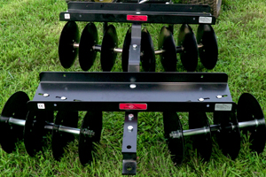 two disc harrows in tandem unit